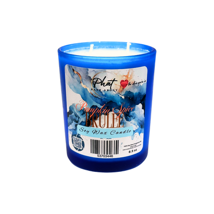 Blue candle with a label on a white background