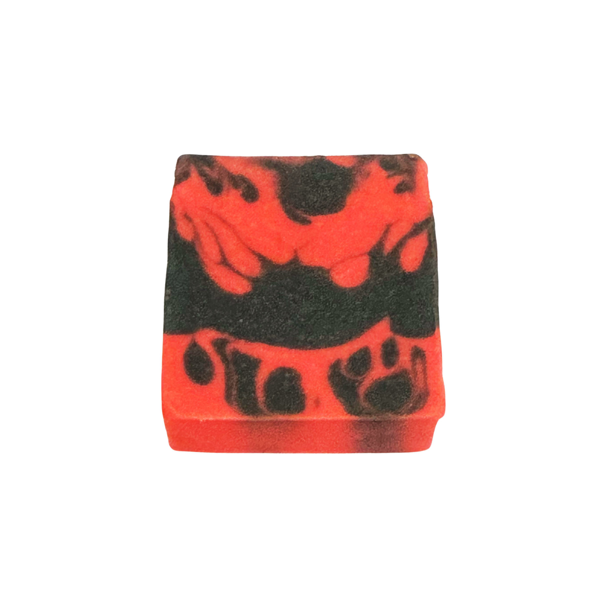 Red and black patterned bar of soap on a white background
