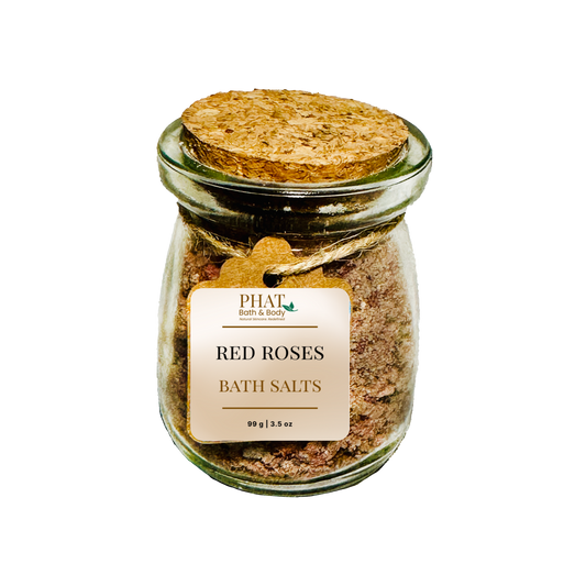 Jar of red roses bath salts with cork lid on a white background