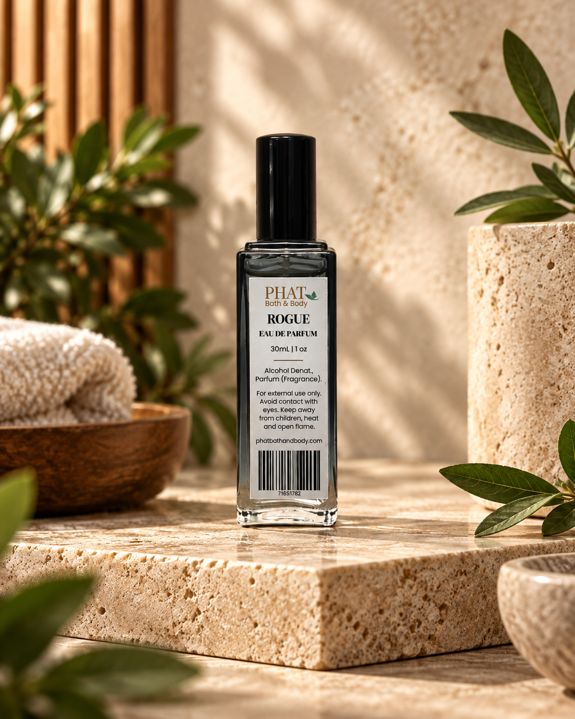 Back label of the Rogue men’s Eau de Parfum bottle in a luxury themed setting.