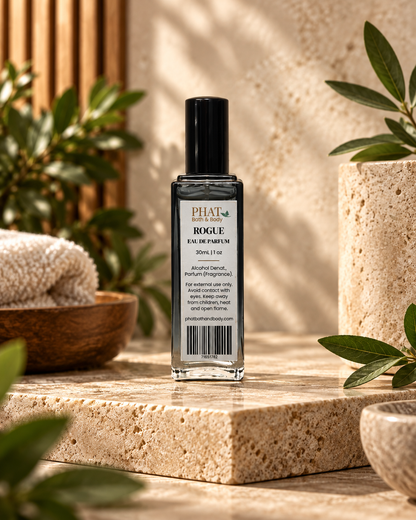 Back label of the Rogue men’s Eau de Parfum bottle in a luxury themed setting.