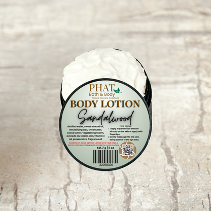 Body lotion container with 'Phat Bath & Body' label on a textured beige background