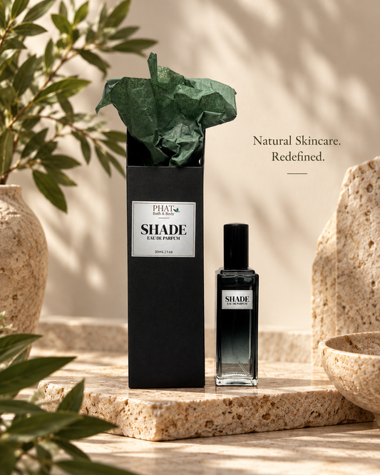Shade men’s Eau de Parfum bottle with black gift box and green tissue in a luxury setting.