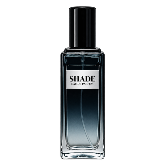 Phat Bath & Body Shade Men’s Eau de Parfum in a tall clear glass bottle with black cap, warm tan label, and dark blue-gray fragrance, shown as the main men’s fragrance product image.