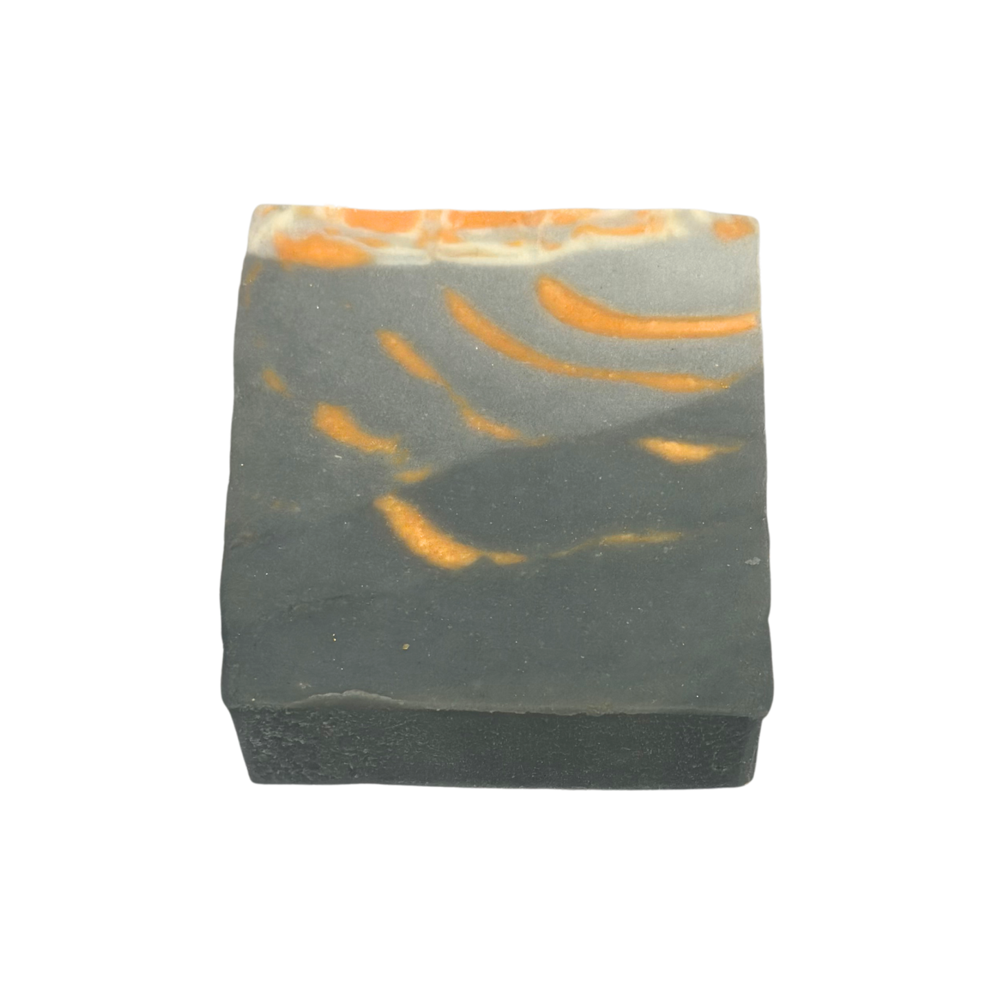 Bar of soap with orange and gray marbled pattern on a white background