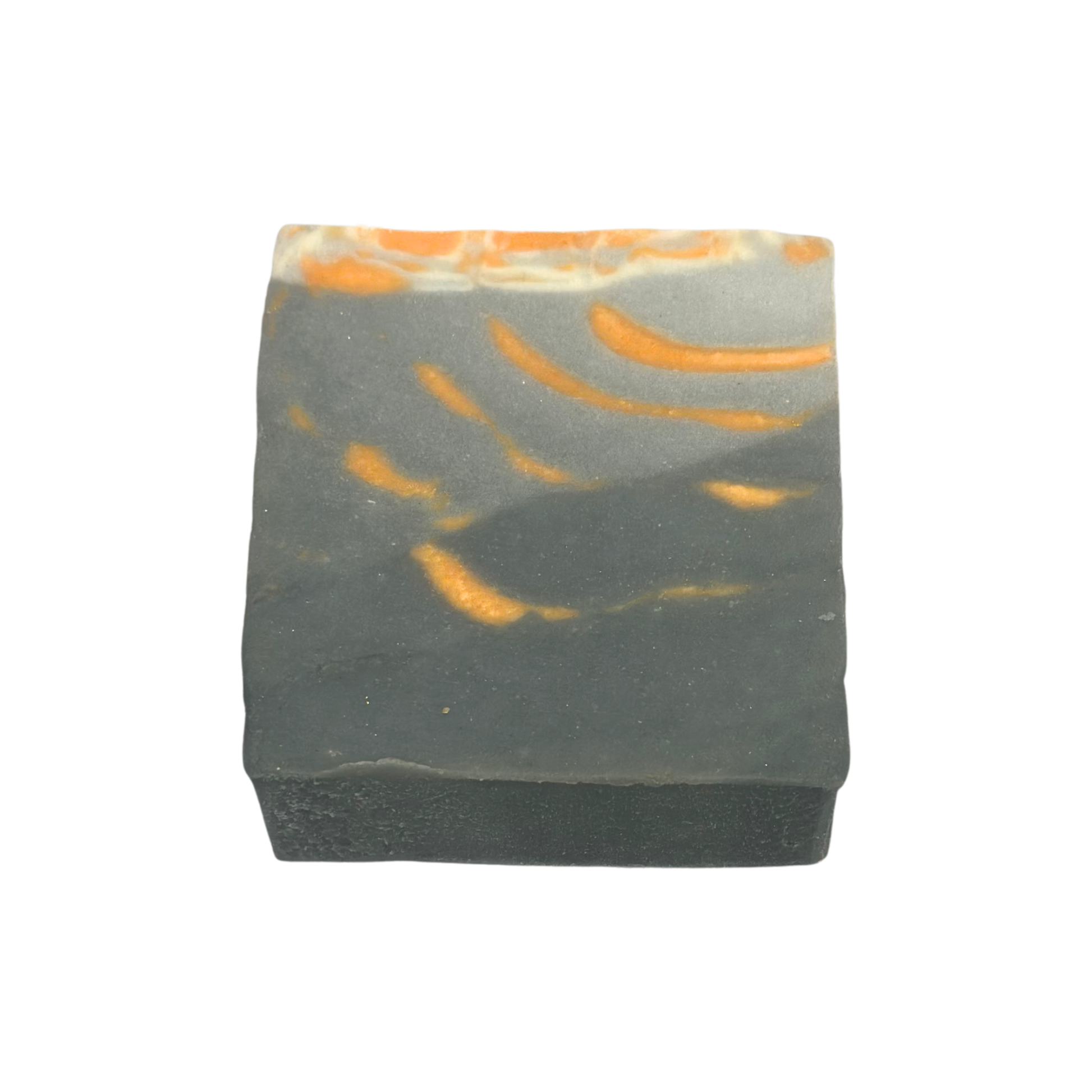 Bar of soap with orange and gray marbled pattern on a white background