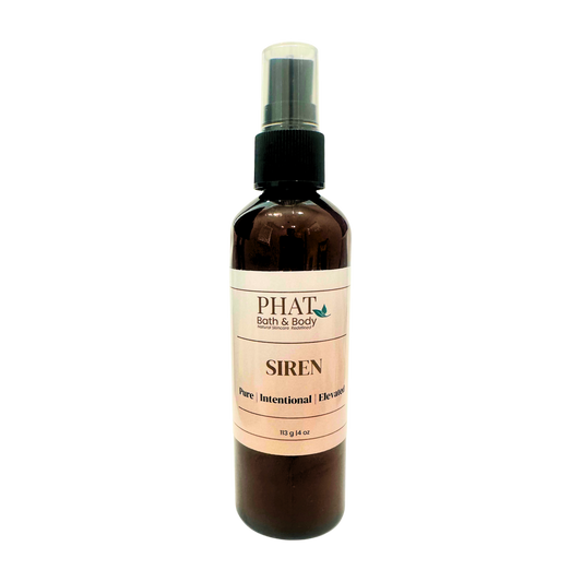 Bottle of 'Siren' body spray by Phat Bath & Body on a white background