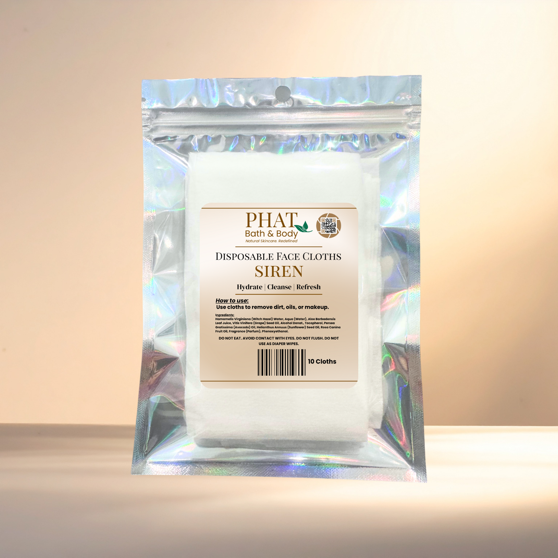 Pack of disposable face cloths with 'PHAT Bath & Body' branding on a reflective surface.