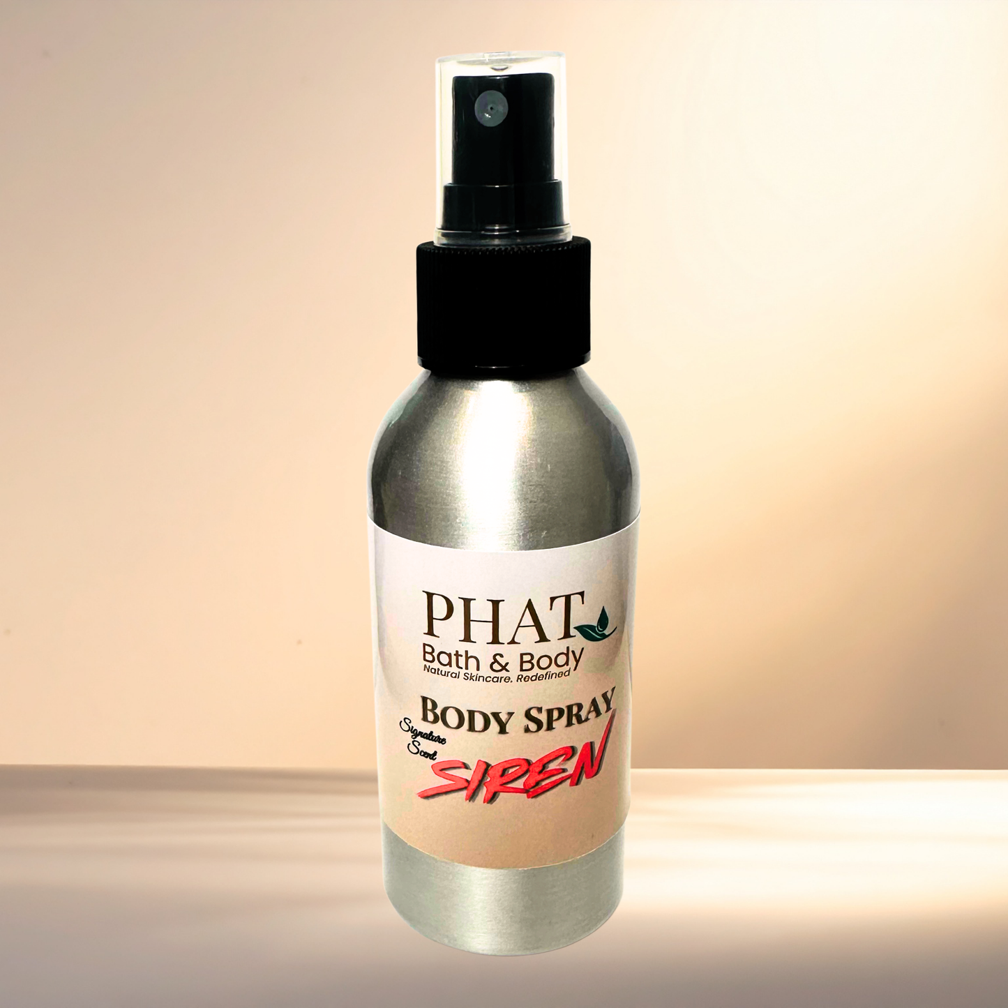 Body spray bottle labeled 'PHAT Bath & Body Siren' on a gradient background