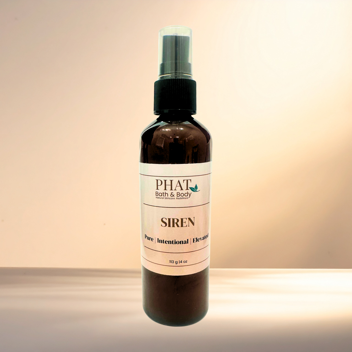 Bottle of 'Siren' by PHAT Bath & Body on a gradient background