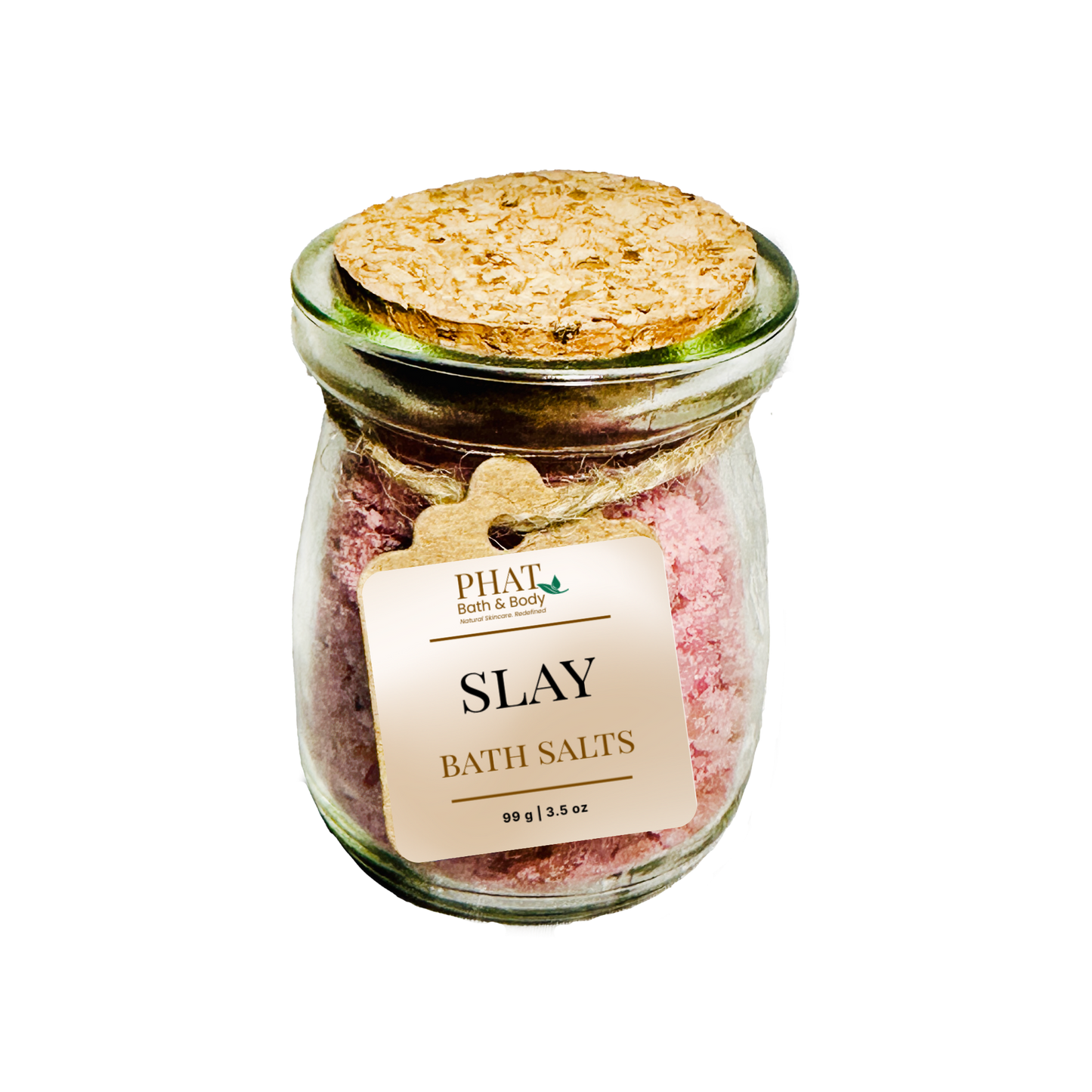 Jar of 'SLAY' bath salts with a cork lid on a white background