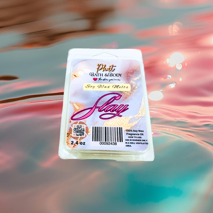 Phat Bath & Body soy wax melt packaging with 'Slay' text on a colorful, blurred background