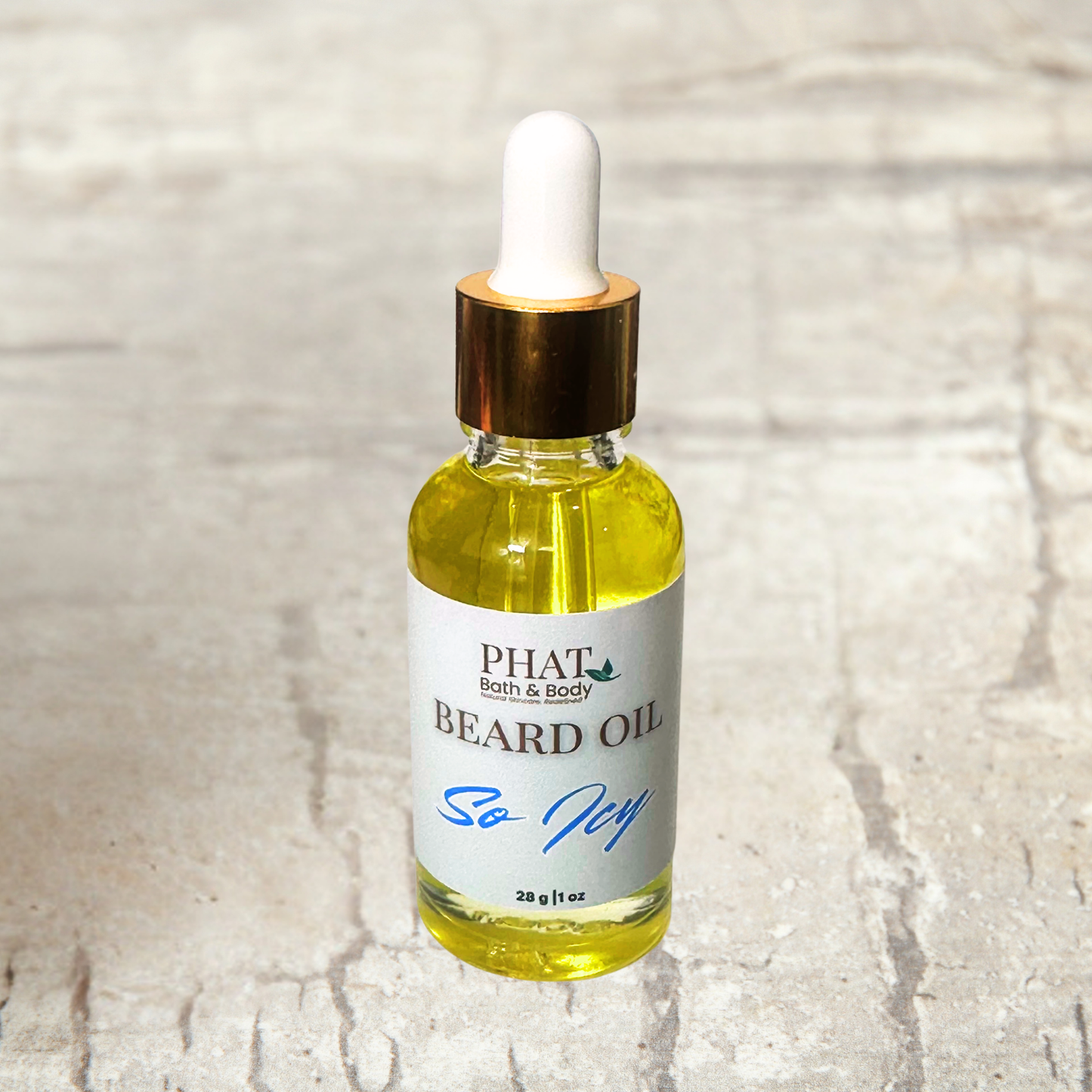 Bottle of Phat Bath & Body beard oil on a textured surface