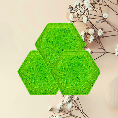 Three green hexagonal steamers on a light pink background with white flowers.
