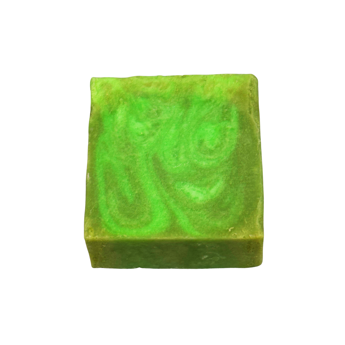 Green soap bar with swirl pattern on a white background