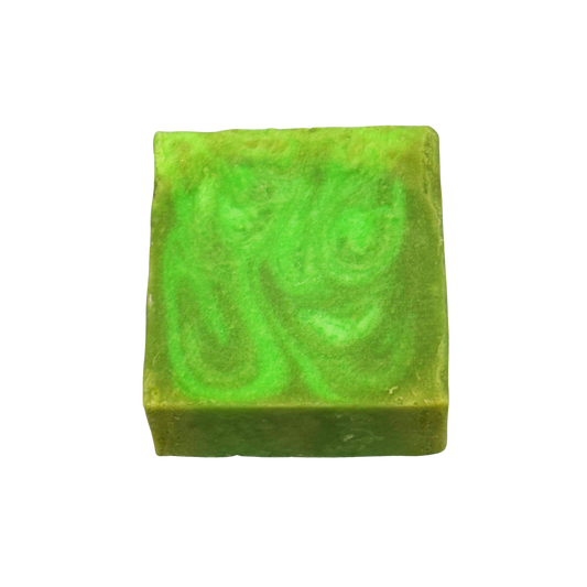 Green soap bar with swirl pattern on a white background