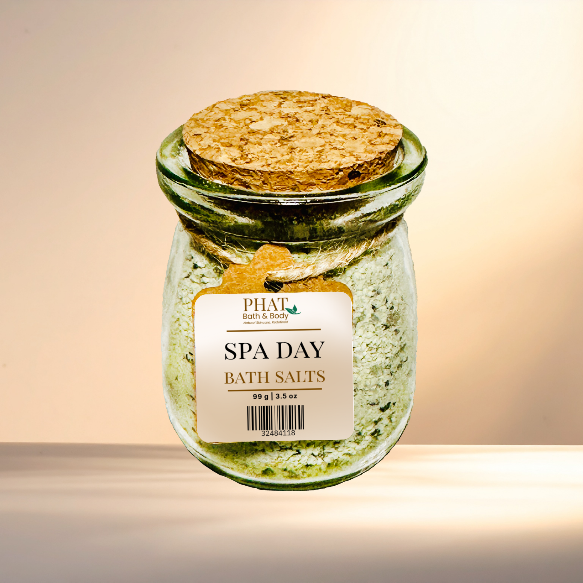 Jar of 'Spa Day' bath salts with a cork lid on a gradient background