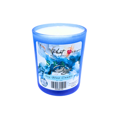 Blue candle with a label on a white background