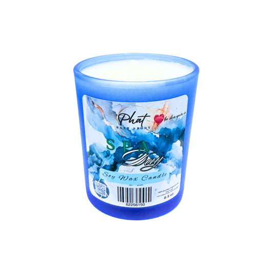 Blue candle with a label on a white background