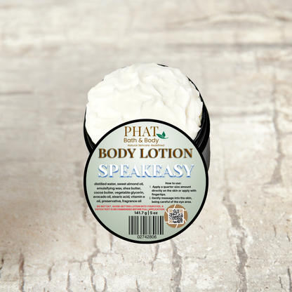 Body lotion container labeled 'Speakeasy' by 'Phat Bath & Body' on a textured beige background