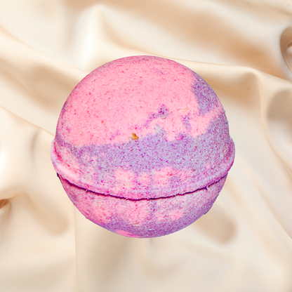 Multicolored bath bomb on a beige fabric background