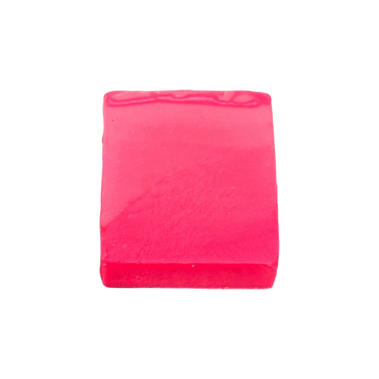 Pink bar of soap on a white background