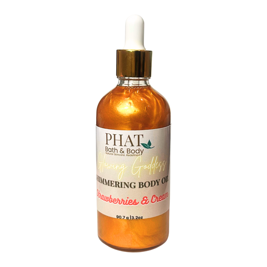 Bottle of PHAT Bath & Body shimmering body oil with a dropper on a white background
