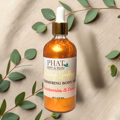 Bottle of PHAT Bath & Body body oil with a dropper on a beige fabric background with green leaves.