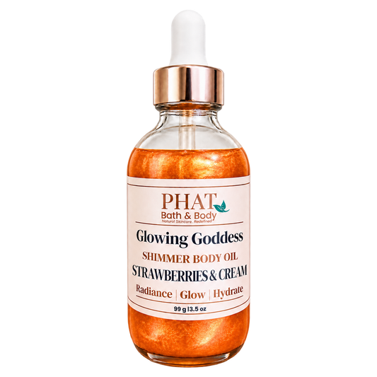 Phat Bath & Body Glowing Goddess Shimmer Body Oil in Strawberries & Cream, 3.5 oz glass dropper bottle with orange-gold shimmer.
