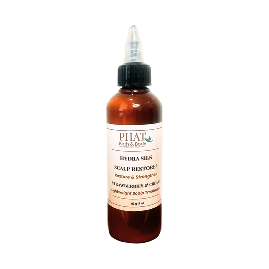 PHAT Bath & Body Hydra Silk Scalp Restore + hair treatment in an amber bottle with a black cap and white label, shown on a plain white background.