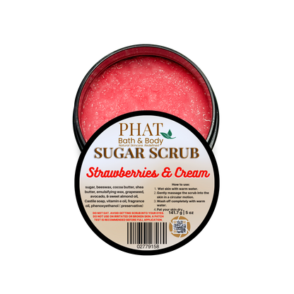 Jar of sugar scrub labeled 'Strawberries & Cream' by Phat Bath & Body on a white background.