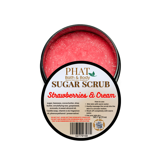 Jar of sugar scrub labeled 'Strawberries & Cream' by Phat Bath & Body on a white background.