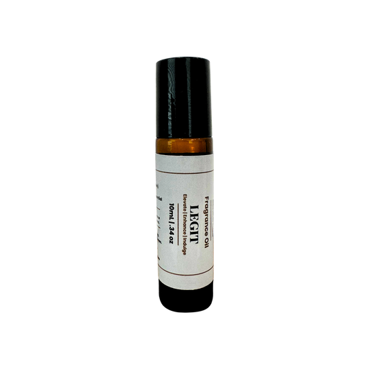 A 10ml amber glass roll-on bottle with a black cap and a white label reading 'LEGIT Fragrance Oil'.