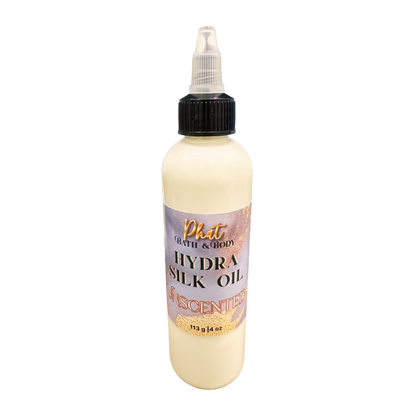 Bottle of Phat Bath & Body Hydra Silk Oil on a white background
