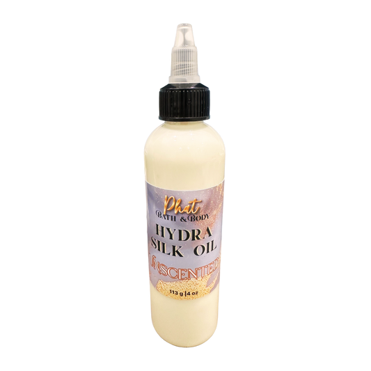 Bottle of Phat Bath & Body Hydra Silk Oil on a white background