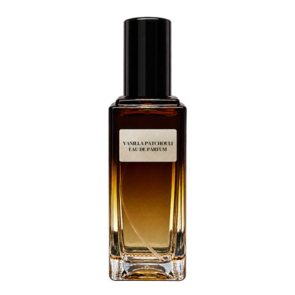 Phat Bath & Body Vanilla Patchouli Eau de Parfum in a rectangular amber-toned glass bottle with a black cap and cream-colored label, isolated on a transparent background.
