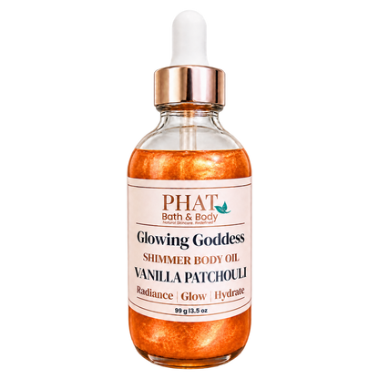 Phat Bath & Body Glowing Goddess Shimmer Body Oil in Vanilla Patchouli, 3.5 oz glass dropper bottle with luminous orange-gold shimmer.