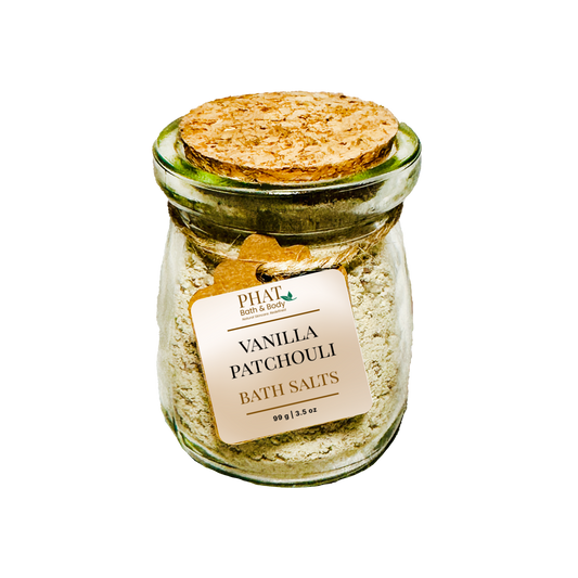 Jar of Vanilla Patchouli Bath Salts with a cork lid on a white background