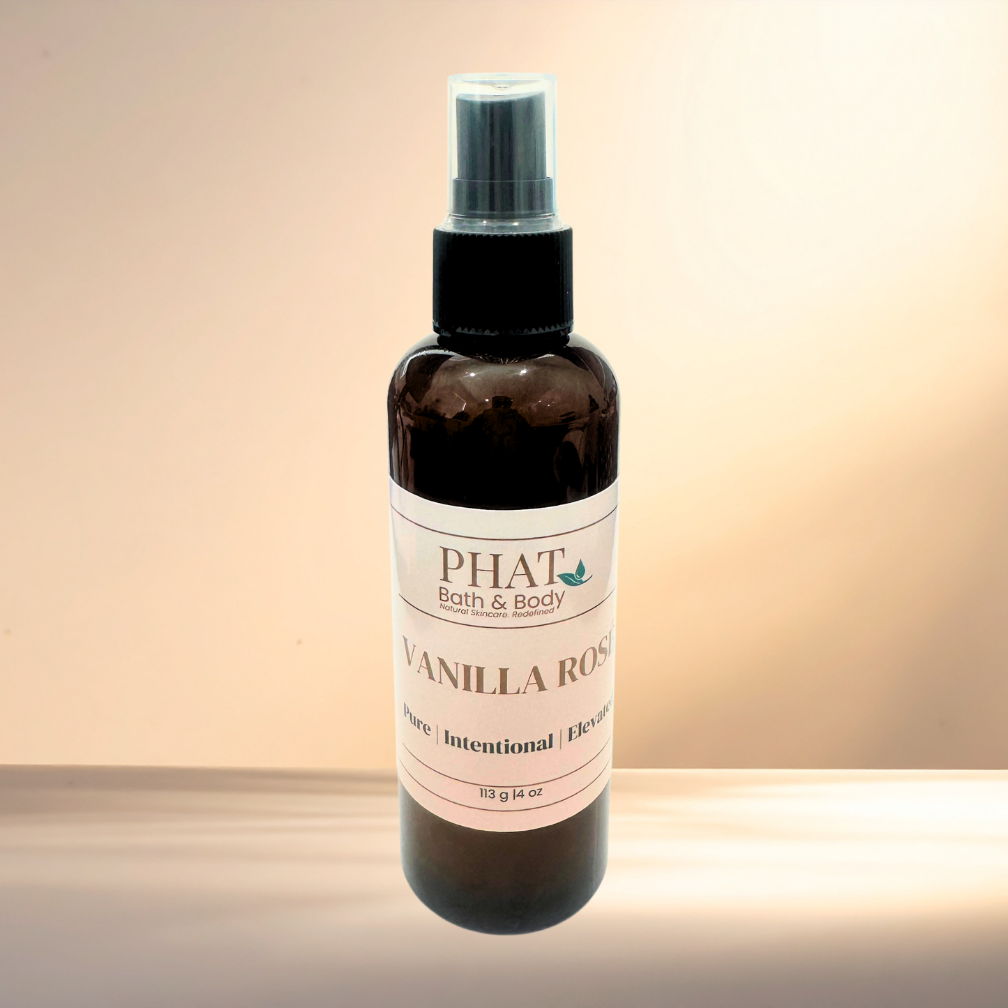 Vanilla Rose spray bottle by Phat Bath & Body on a gradient background