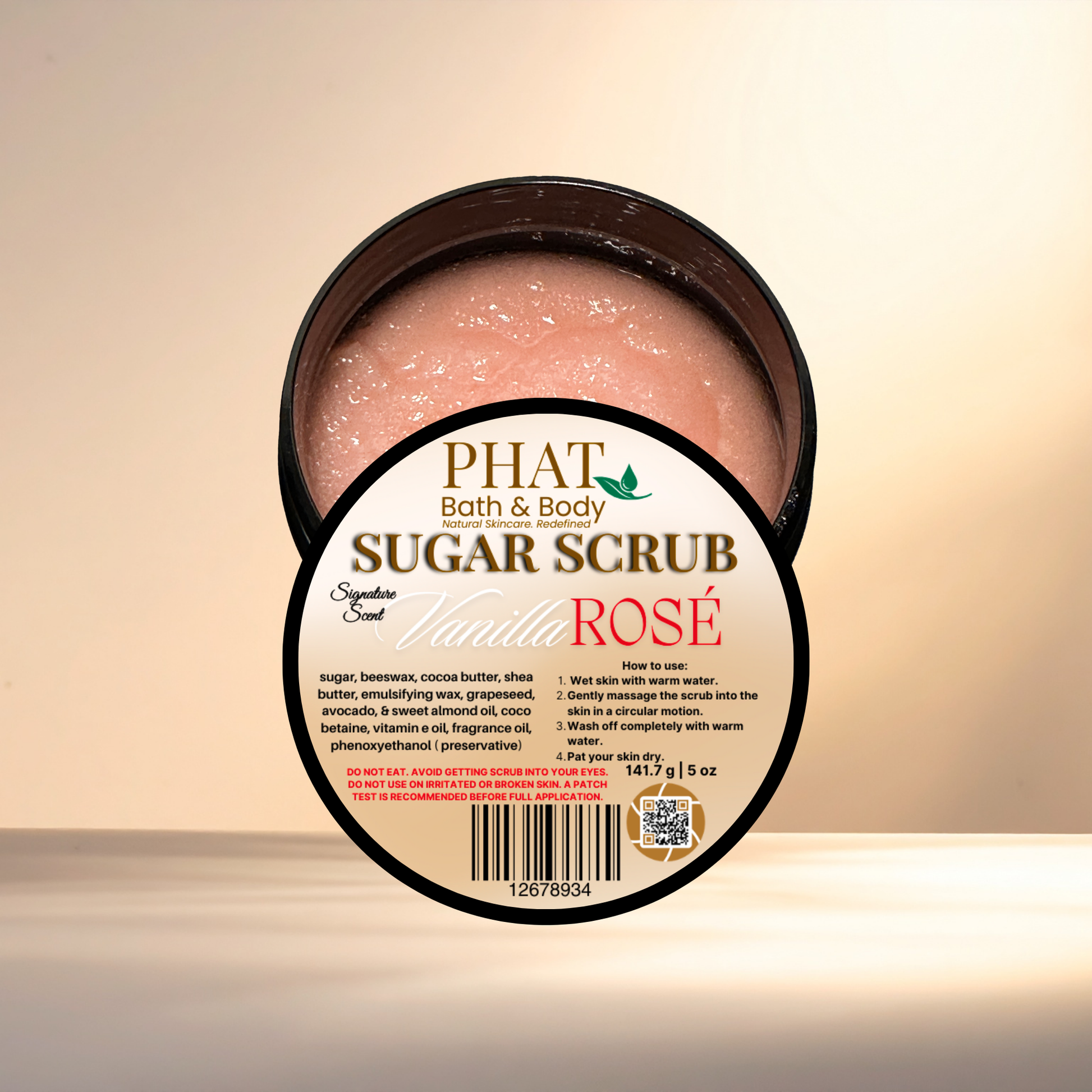 Container of Phat Bath & Body Sugar Scrub with a label on a beige background