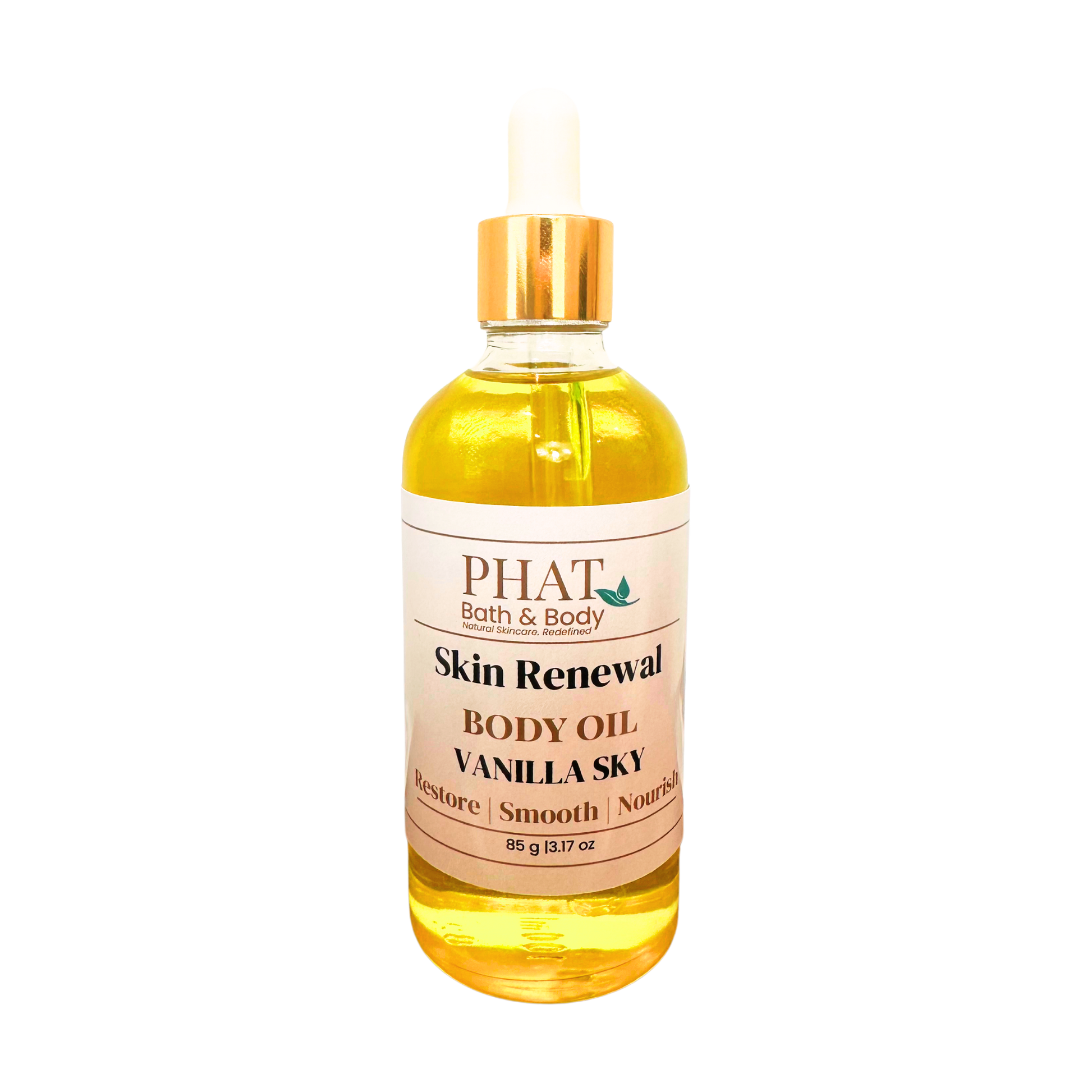 A bottle of PHAT Bath & Body Skin Renewal Body Oil in Vanilla Sky scent, filled with golden yellow oil and featuring a white label with a gold cap, set against a plain white background.