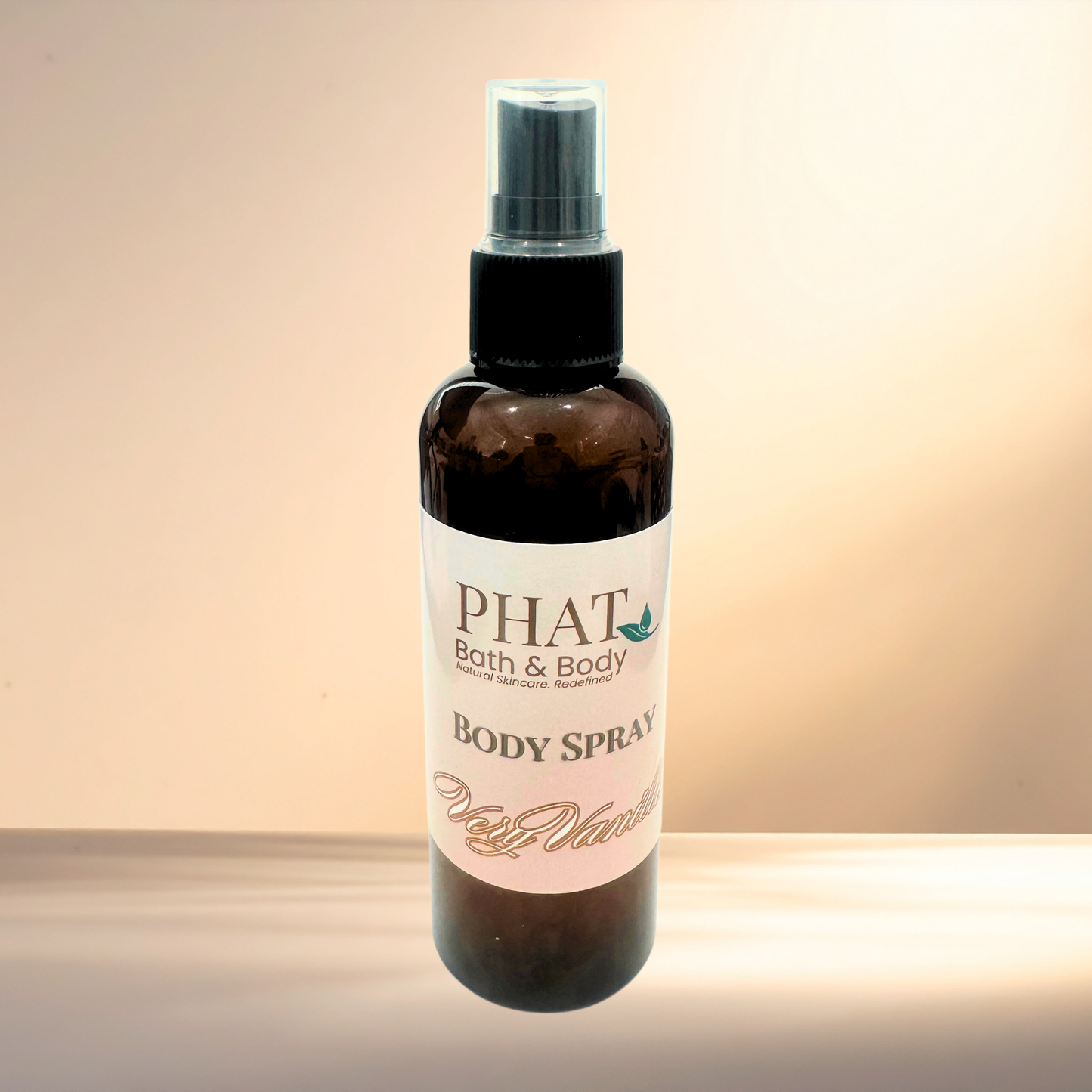 Body spray bottle with 'PHAT Bath & Body' label on a gradient background