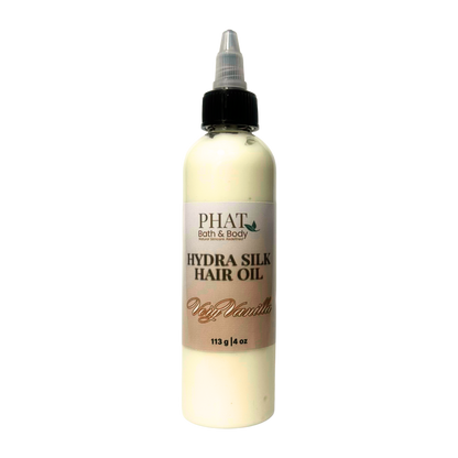 Bottle of Phat Bath & Body Hydra Silk Hair Oil on a white background