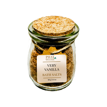 Jar of 'Very Vanilla Bath Salts' with a cork lid on a white background