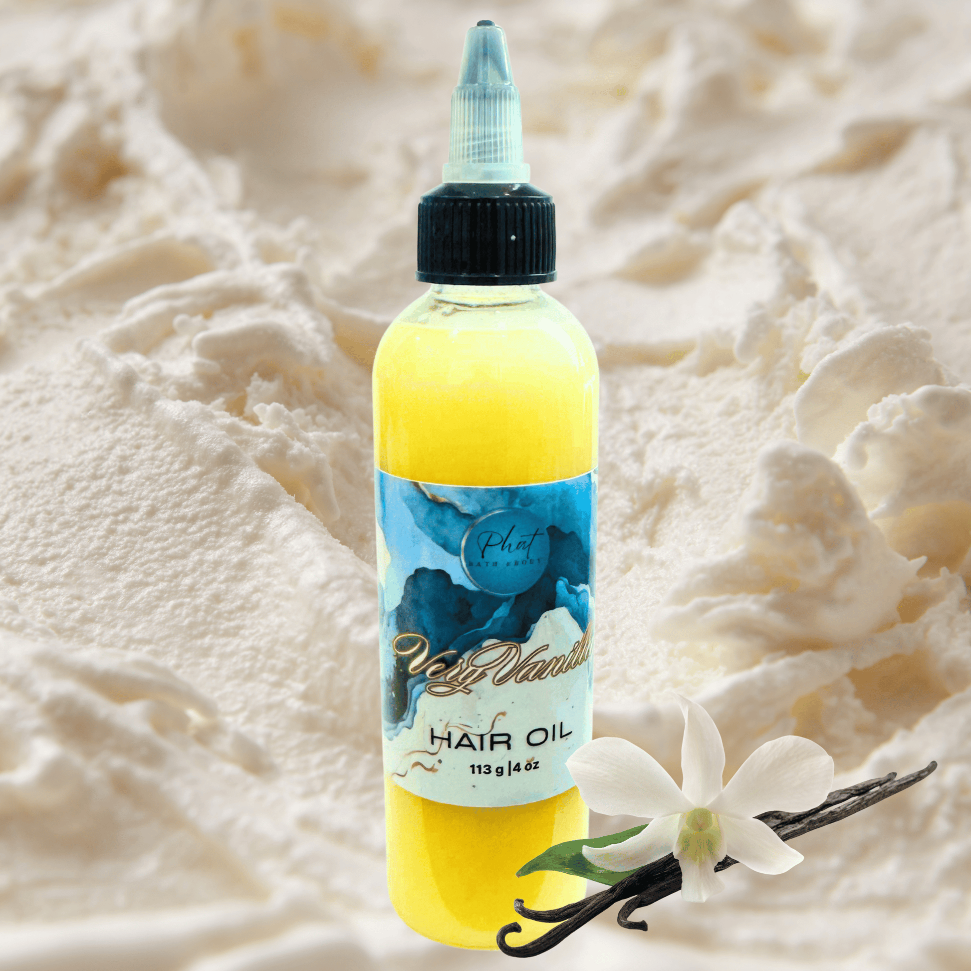 Bottle of hair oil with vanilla flower and vanilla bean on a soft, beige background