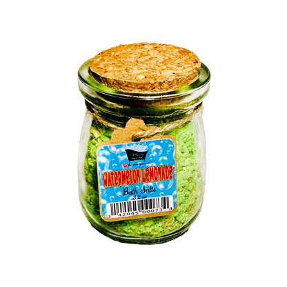Jar of bath salts with a cork lid on a white background