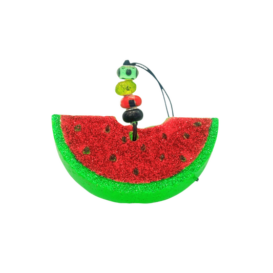 Decorative watermelon slice car freshie with beads on a white background
