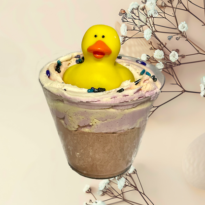 Bubble bomb with a yellow rubber duck on a light background