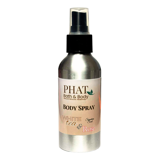 Body spray bottle labeled 'PHAT Bath & Body' with 'White Tea & Rose' scent on a white background