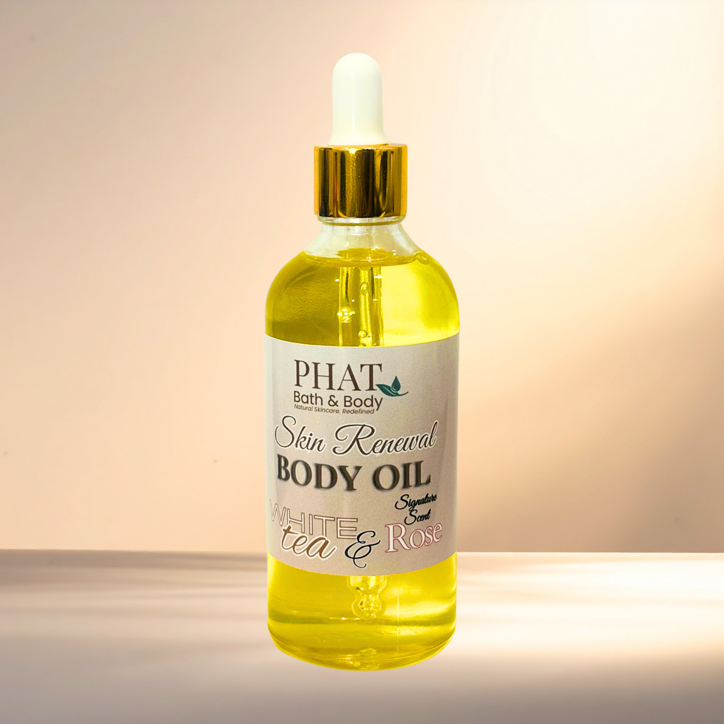 Bottle of Phat Bath & Body skin renewal body oil with a dropper on a gradient background